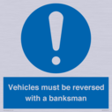 vehicles-must-be-reversed-with-a-banksman~
